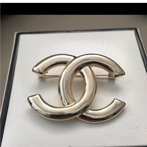 Gold Interlocking Logo Brooch - Designer Style Women’s Jewelry